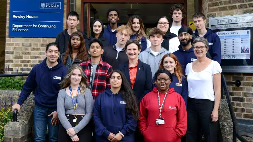 The 2023 Astrophoria Foundation Year cohort, Professor Irene Tracey and Dr Jo Begbie standing outside the Oxford University Department of Continuing Education building